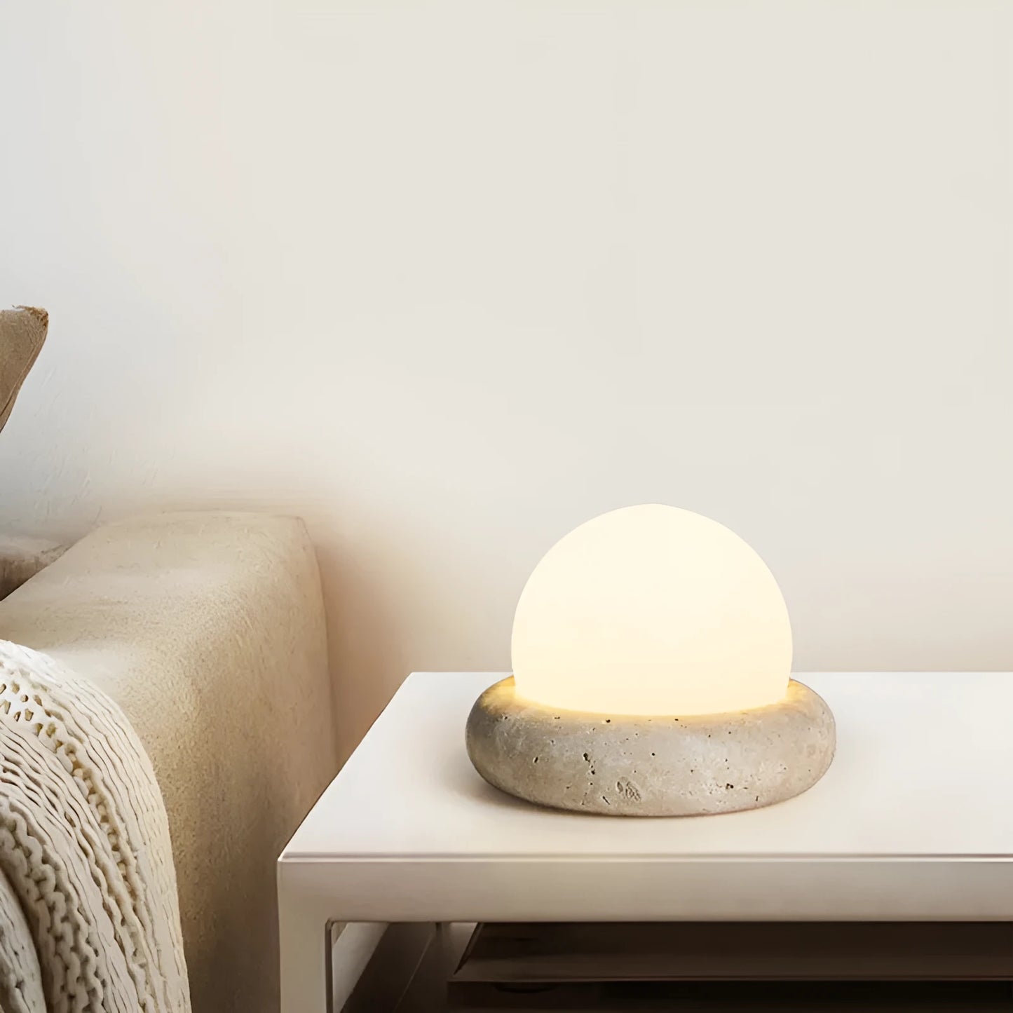 Cream coloured bedside night lamp with remote control measuring 15.5cm diameter