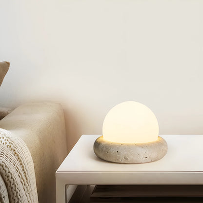 Cream coloured bedside night lamp with remote control measuring 15.5cm diameter