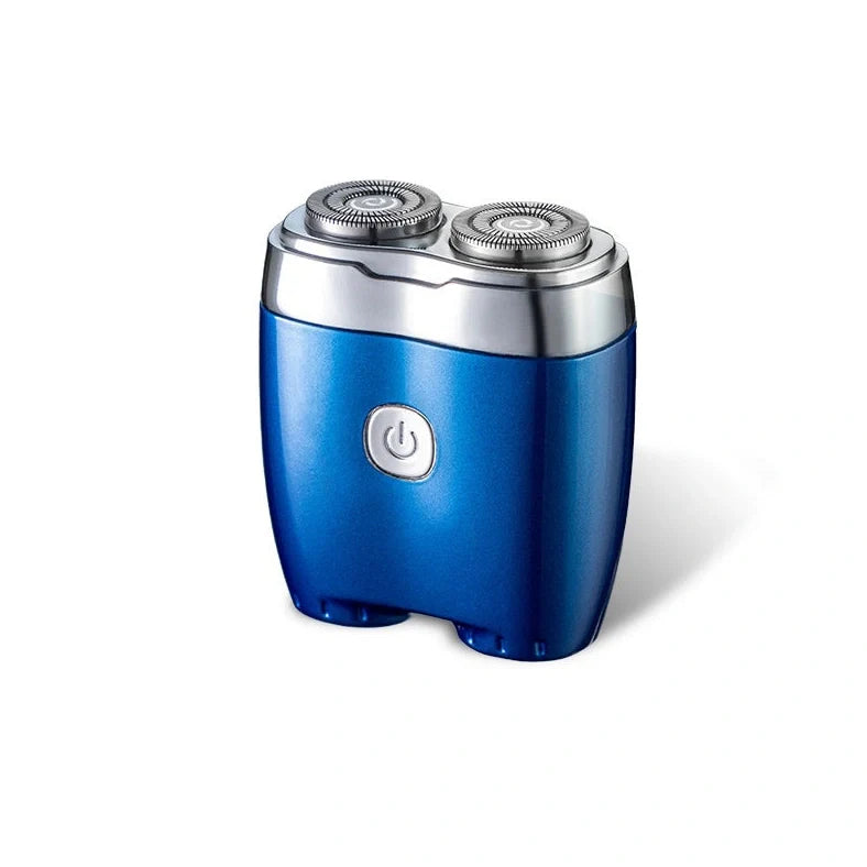 Silver portable electric shaver with floating double cutter heads, USB charging port, and rubberised grip