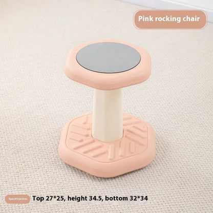 Balance children's plastic rocking stool in blue colour on a wooden floor.