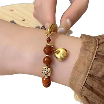 Golden south red ingot charm bracelet in antique style for women