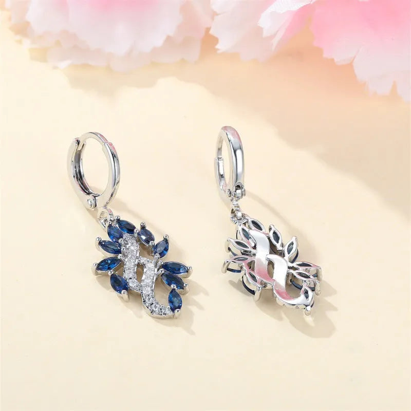 Women's earrings simple minority all-match earrings in platinum sapphire blue colour made from alloy material with one pair included for versatile everyday wear