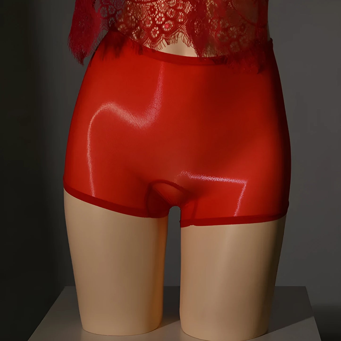 Shiny men's seamless underwear stockings in red, black, grey, white, and skin-tone colours on a mid waist.