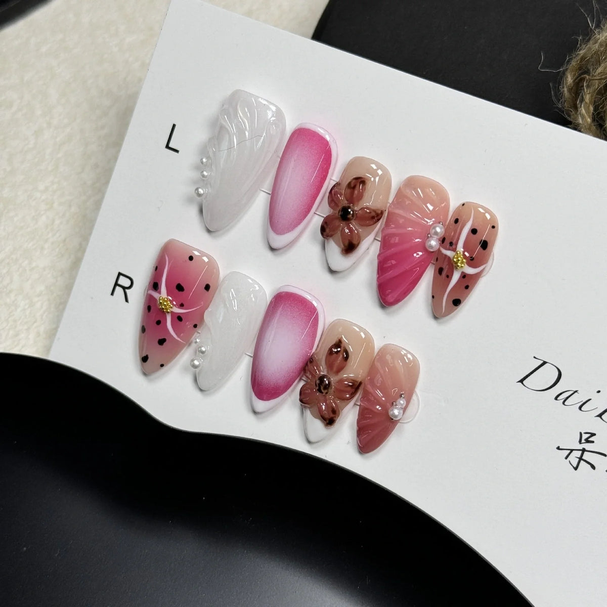 Hand-painted nail patches with three-dimensional carved embossed candy patterns in almond shape