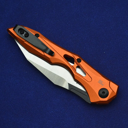 Black folding fruit knife with D2 steel blade and aluminium handle, shown open with length scale.