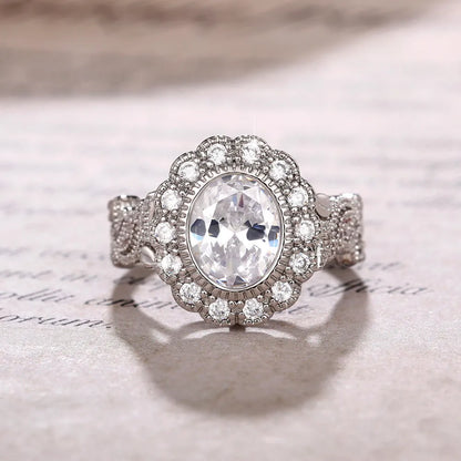 Round zircon ring with geometric design in F1770 white gold colour plating, available sizes 6 to 10