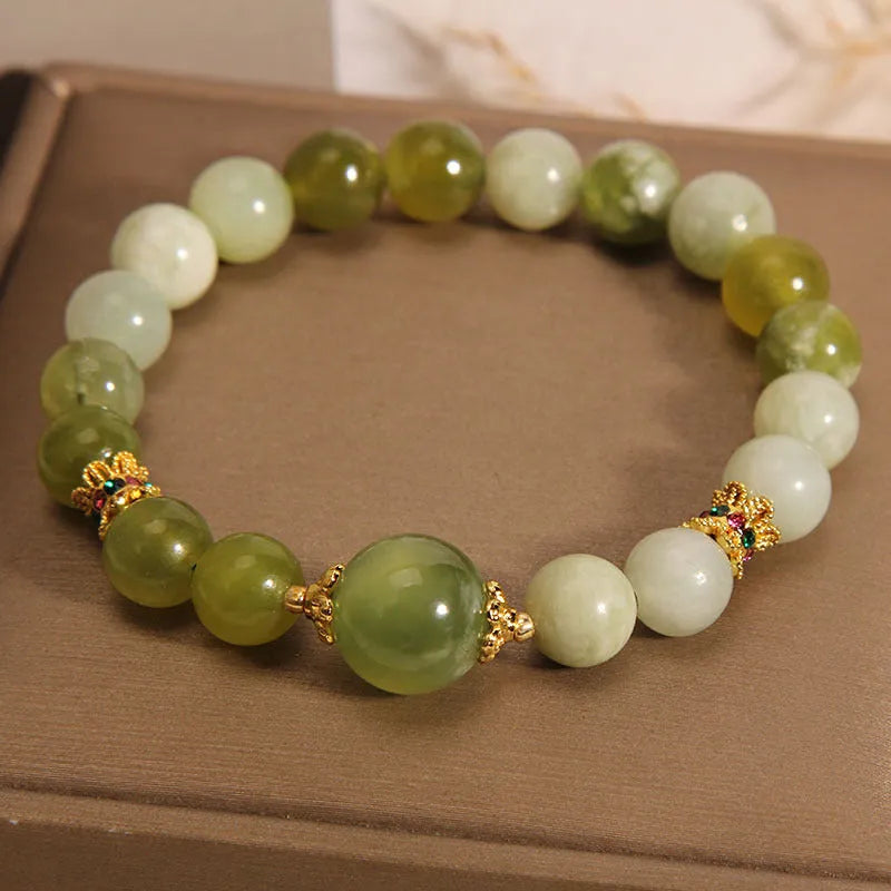 Original design jade bracelet in Xiuyan jade green colour, women's light luxury sweet Mori style jewellery.