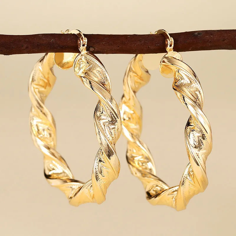 Geometric ring design ear clips for women with drop-shaped copper construction and electroplated finish