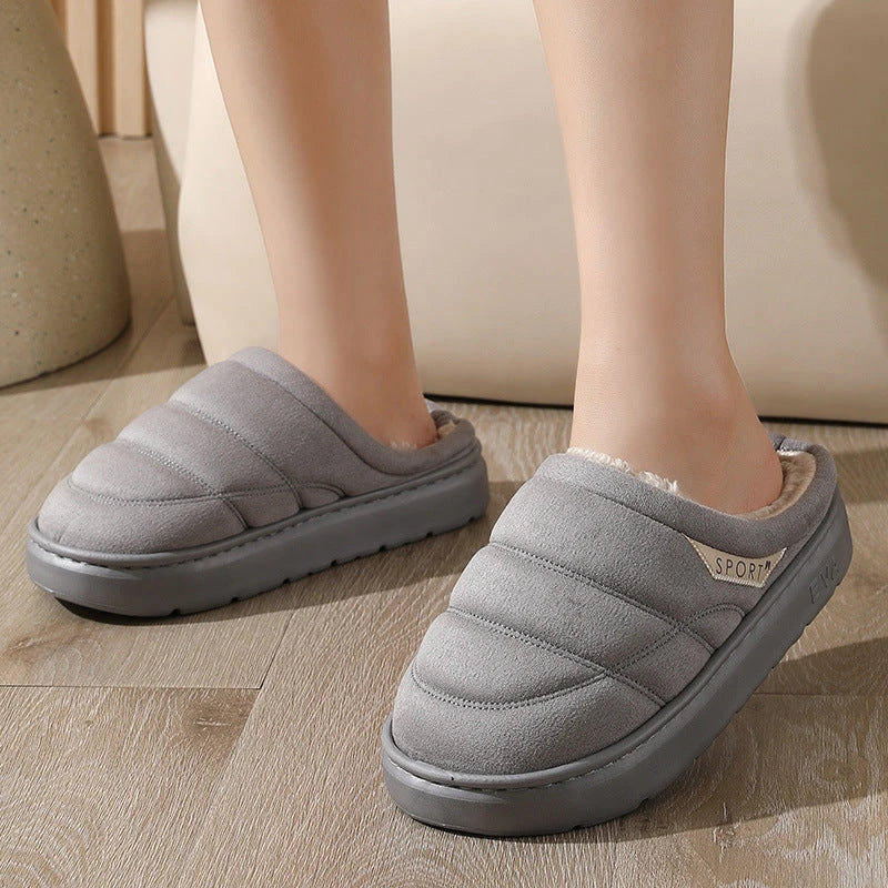 Cozy plush slip-on slippers in various colors, featuring a soft suede-like upper and a supportive EVA sole for maximum comfort and warmth.
