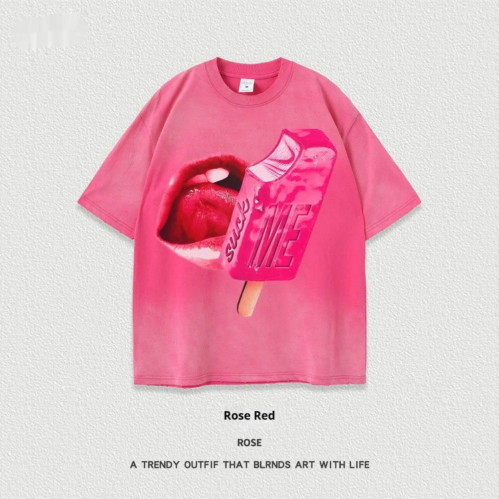 A loose-fit heavy washed cotton T-shirt with a cartoon print, shown in a selection of available colours.
