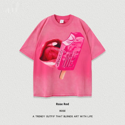 A loose-fit heavy washed cotton T-shirt with a cartoon print, shown in a selection of available colours.