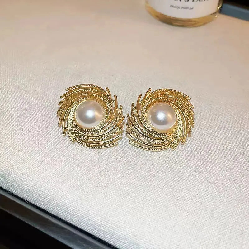 Pearl flower earrings with electroplated alloy construction and irregular vintage design