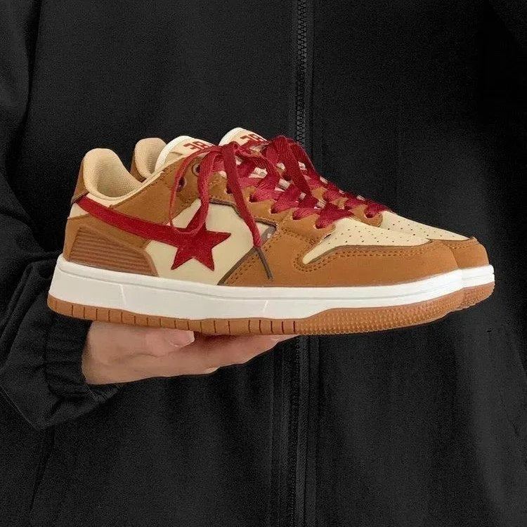Brown women's low-top platform sneakers with lace-up front and round toe