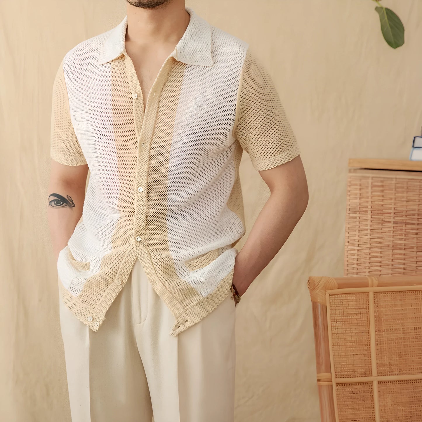 Beige cotton linen blend short-sleeved cardigan with lapel collar shown on hanger