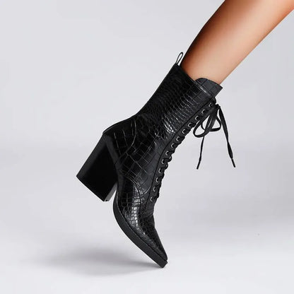 Dark brown women's lace-up ankle boots with a pointed toe and a chunky block heel.