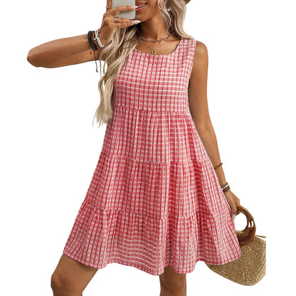 Women's sleeveless plaid dress with an oversized swing skirt in light blue.