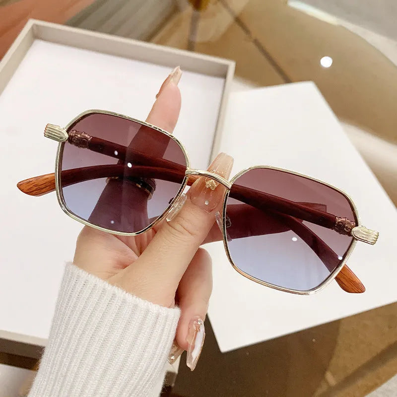 Women's frameless glasses with wood grain pattern and gold alloy frame in double blue colour.