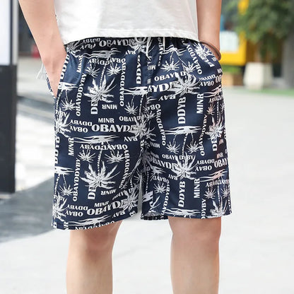 Men's floral patterned swim shorts with five-point cut design