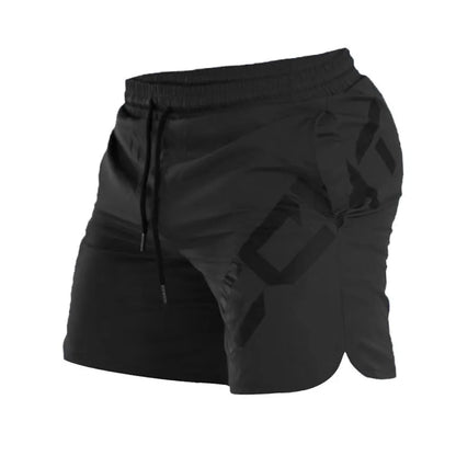 Man wearing black knee-length nylon training shorts with an elastic mid waist.