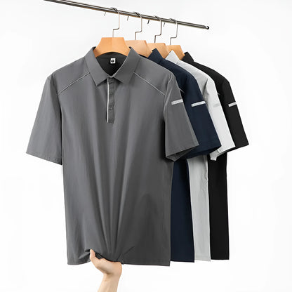 Quick-drying breathable polo shirt in solid colour with short sleeves and regular fit
