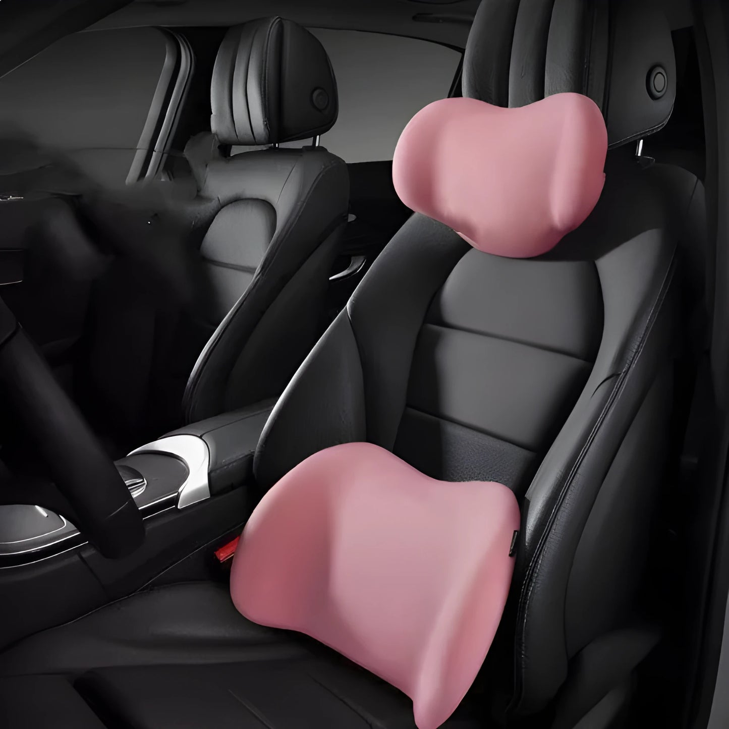 Black memory cotton car headrest cushion and matching lumbar back support placed on a grey car seat.