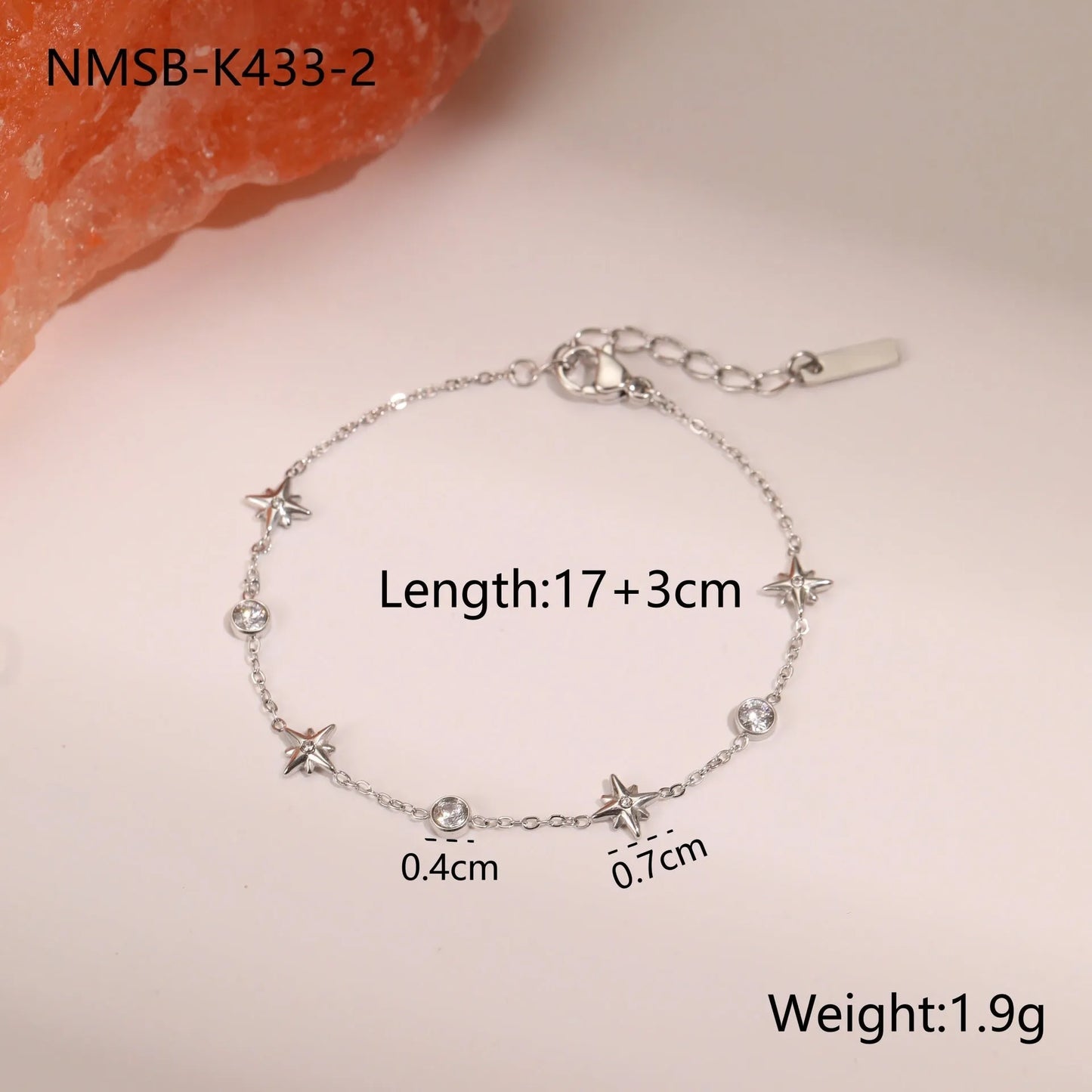 Titanium steel women's bracelet with hexagonal star pendant and 18K gold plating