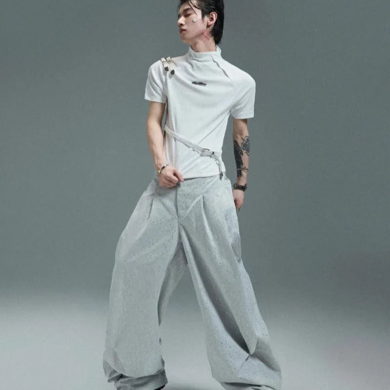 Men's black slim fit cotton t-shirt with metal belt design detail and contrast stitching.