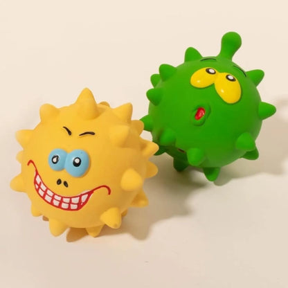 Four natural latex dog squeaky toys with bumpy surfaces and cute faces in blue, green, red, and yellow colours
