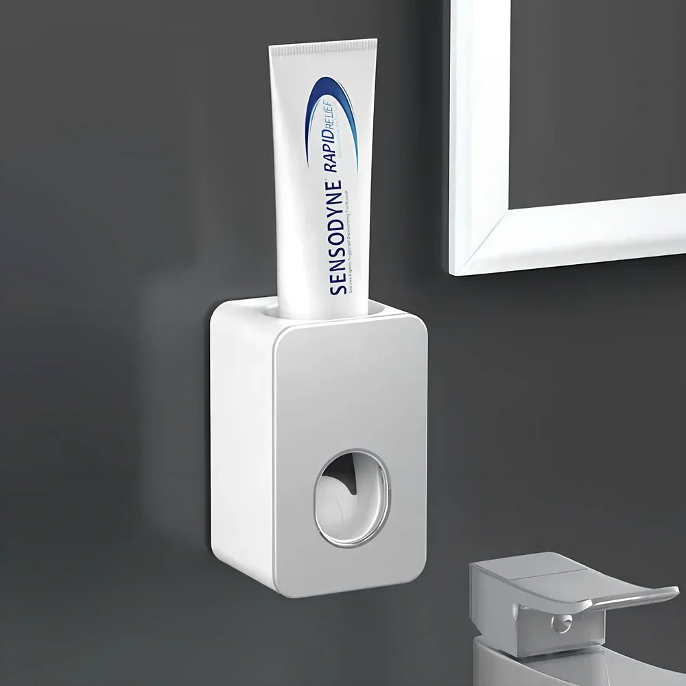 Black wall-mounted automatic toothpaste dispenser with 1 ml pump, punch-free adhesive, 18 cm height for bathroom use