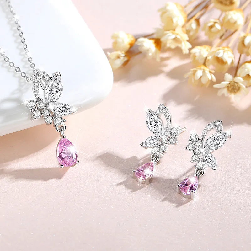 Butterfly shaped silver stud earrings with Swarovski crystal details on wings