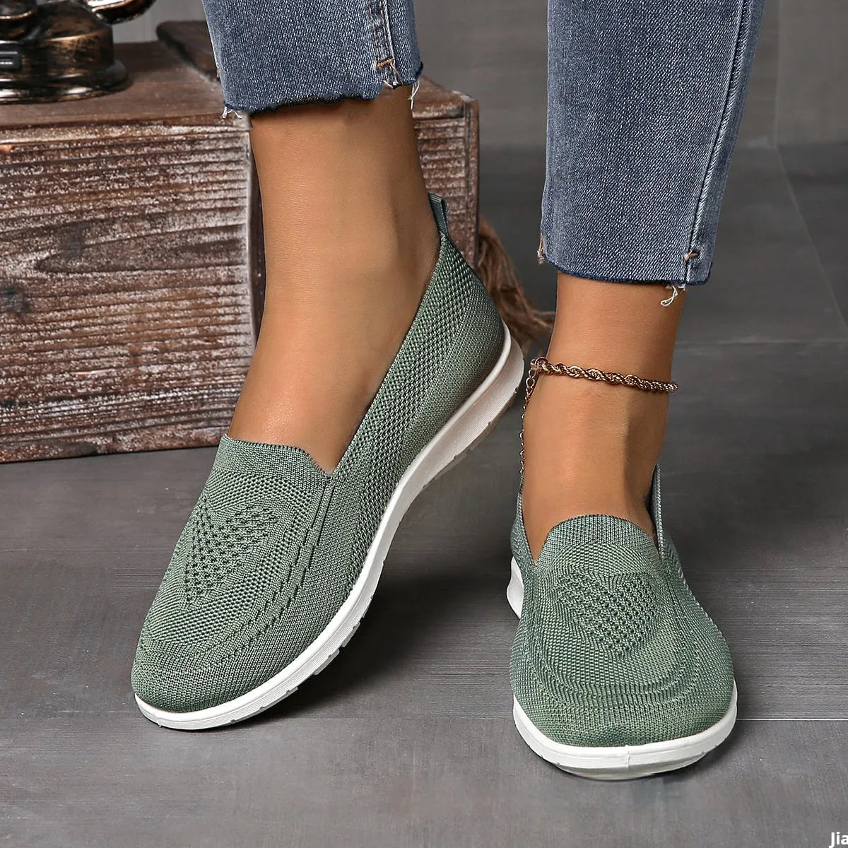 Plus size women's beige casual cloth shoes with low top, flat heel, and heart pattern.