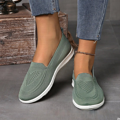 Plus size women's beige casual cloth shoes with low top, flat heel, and heart pattern.