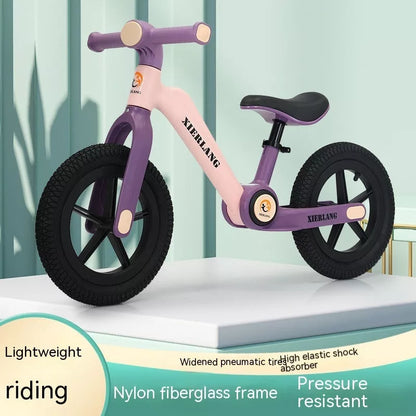 Foldable kids balance bike in grass green, light brown, or pink purple