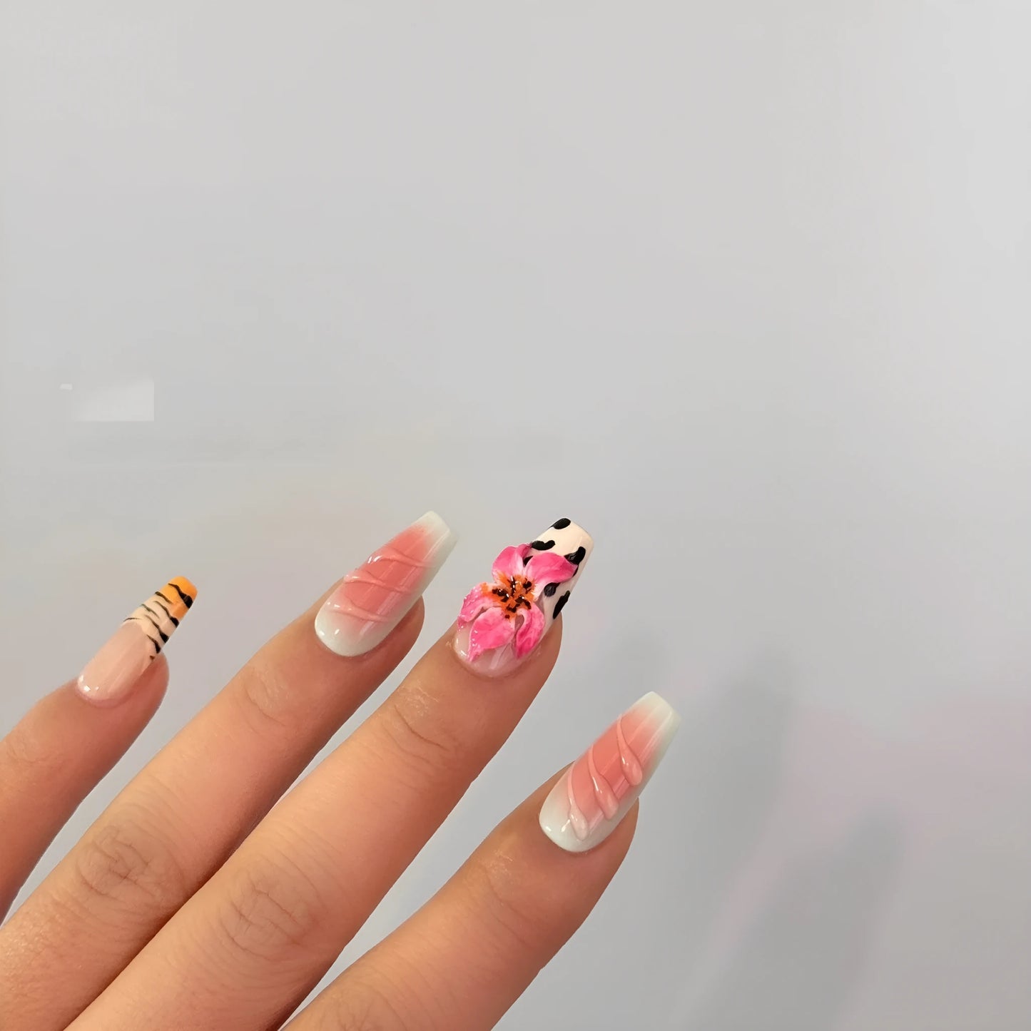 Zebra pattern lily hand carving artificial nails with embossed leopard print design