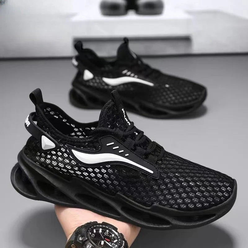Breathable mesh running shoes with lace-up closure, available in black, white blue, and white grey colors