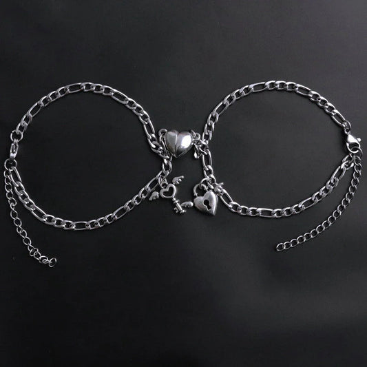 Heart-shaped couple bracelets with adjustable chain, perfect for romantic gifts.