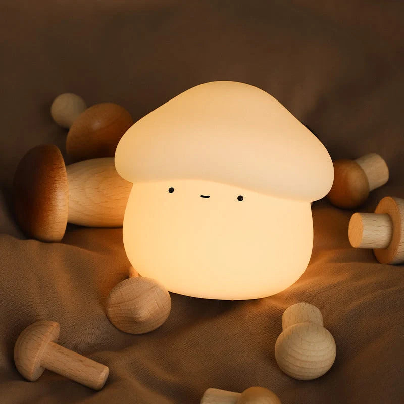 Adorable mushroom-shaped night light with warm yellow glow, perfect for children's bedrooms