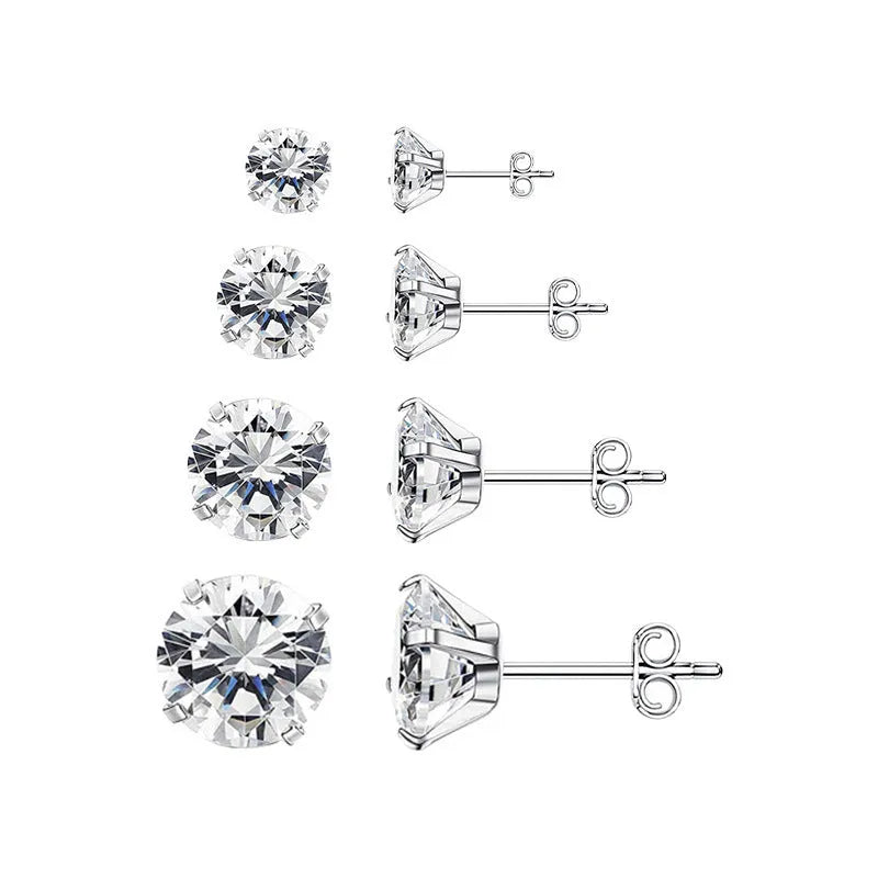 Simple geometric square and round zircon stud earrings in stainless steel with gold and steel colour finishes.