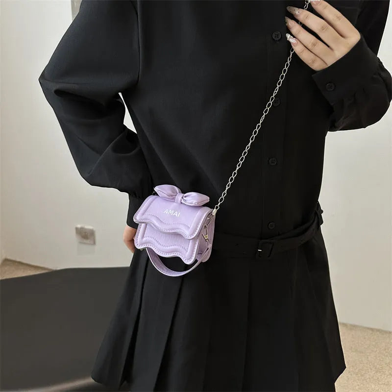 Mini crossbody women's bag in seven colour options with single shoulder strap