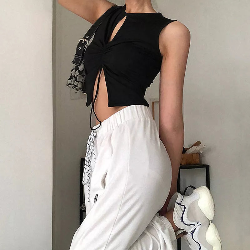 Black slimming knit top with split neckline and adjustable drawstring
