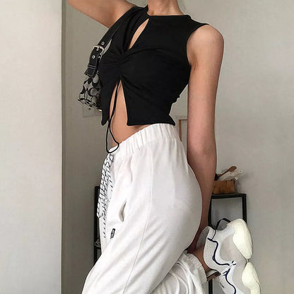 Black slimming knit top with split neckline and adjustable drawstring