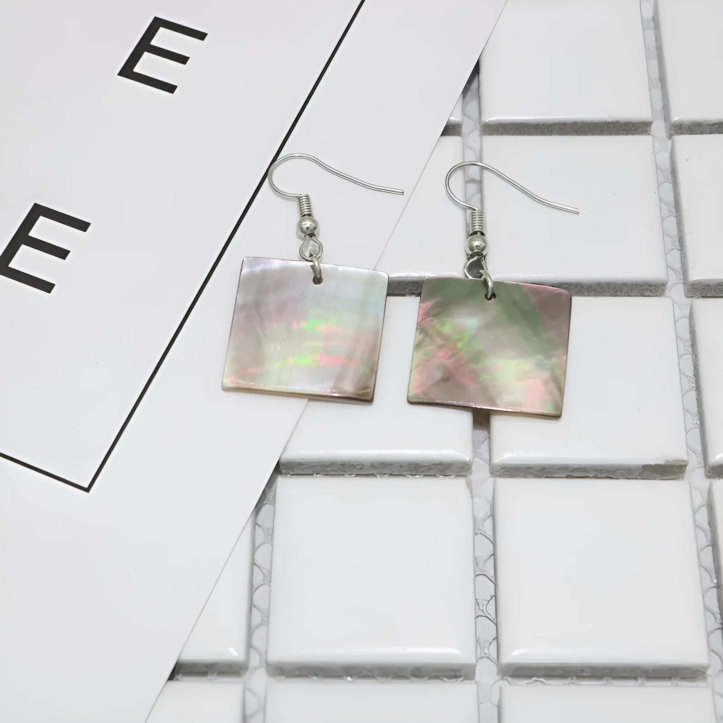 Women's geometric shell earrings in square panther or rectangular shell designs with natural retro style