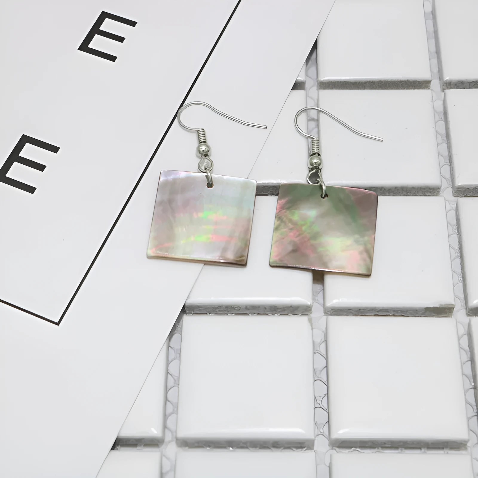 Women's geometric shell earrings in square panther or rectangular shell designs with natural retro style