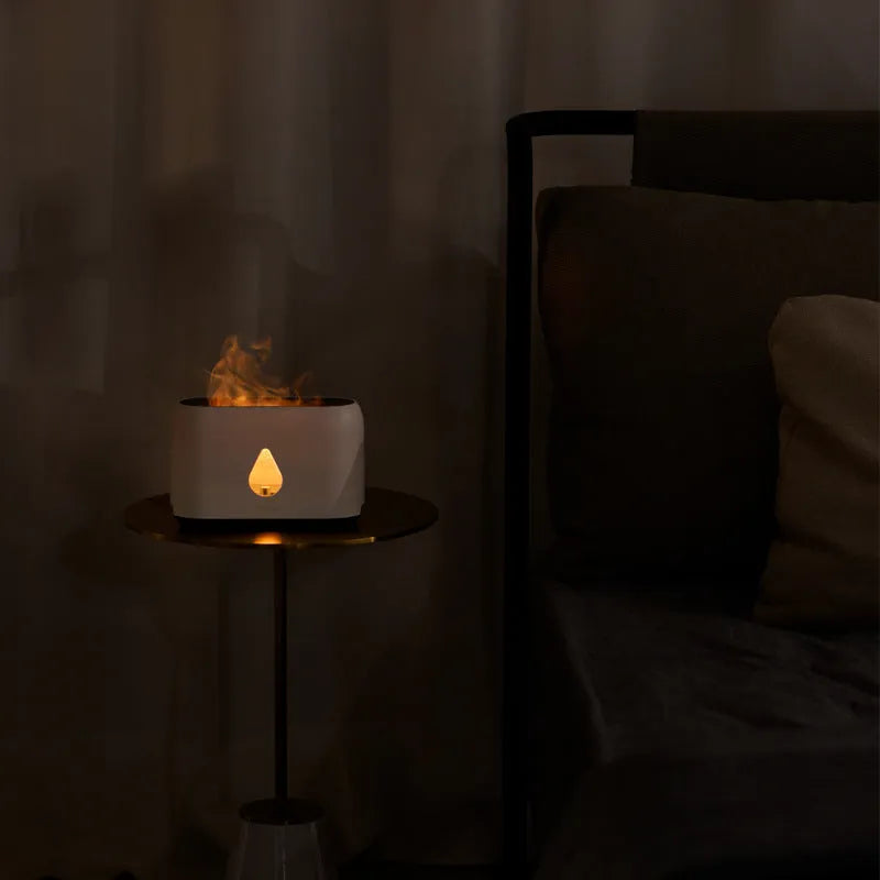 Mini remote control flame diffuser air humidifier, round plastic USB unit with 2-8 hour timer, shown in white, pink, green or grey