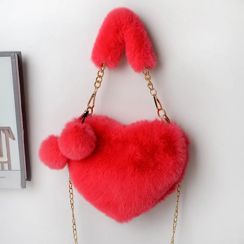 Plush heart-shaped women's handbag in medium size with removable shoulder strap