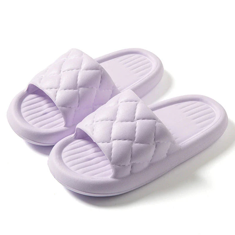 Comfortable home slippers with non-slip soles, featuring breathable and waterproof EVA material in a variety of stylish colors.