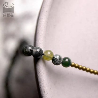 Children's multi-layered bracelet with natural crystal and semi-precious stone beads in ethnic national style design