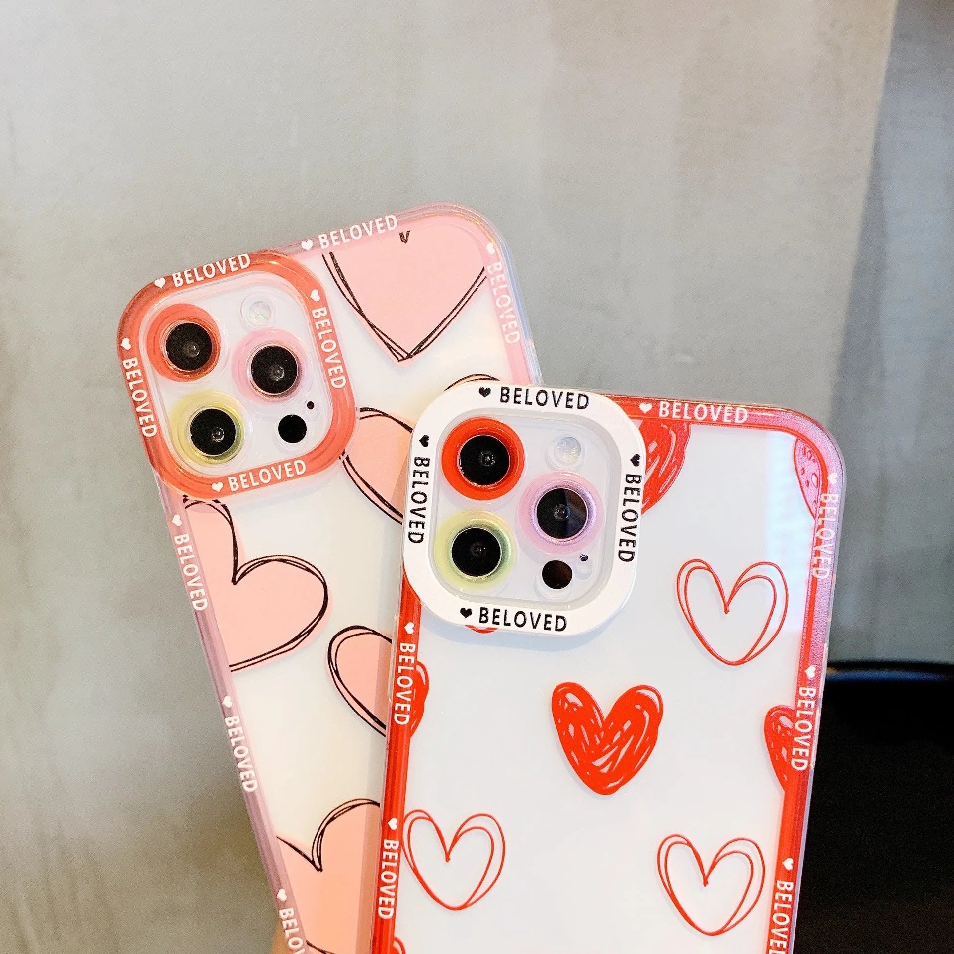 Pink and graffiti red TPU iPhone cases featuring love heart and angel eye designs for multiple models