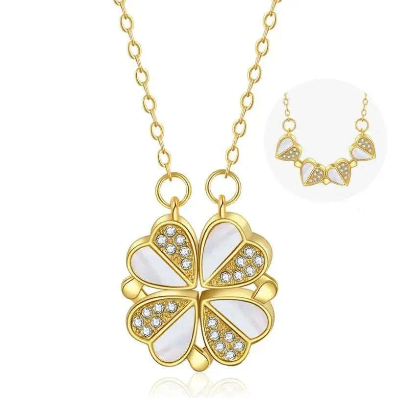 Exclusive four-leaf clover pendant necklace in stainless steel with crystal heart charm, a versatile jewellery piece for women