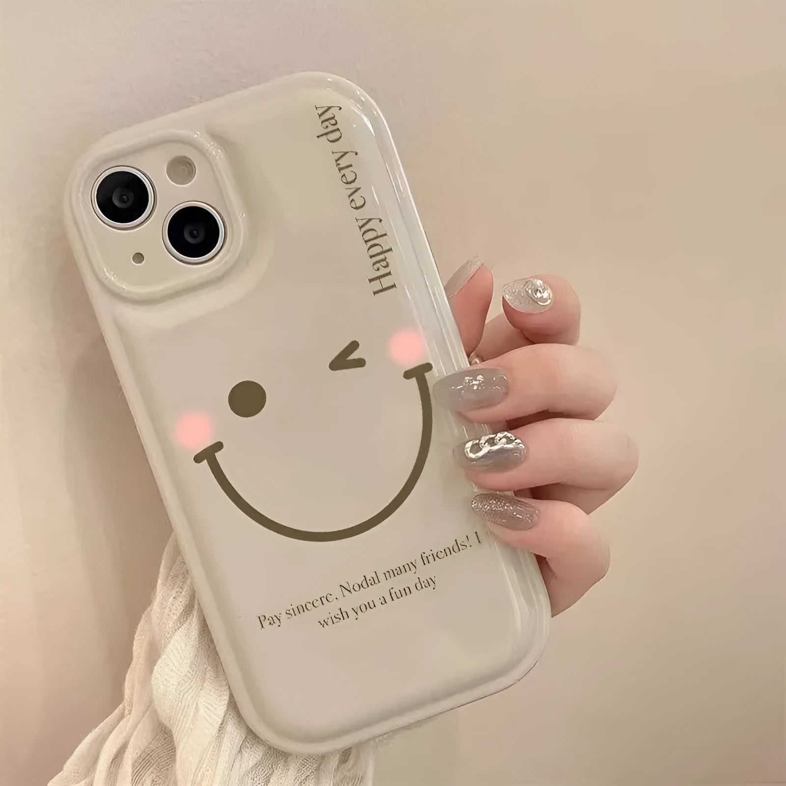 Mint green TPU iPhone case with optional matching chain on a phone